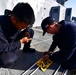 USS San Diego (LPD 22) Sailors Set Up Phone and Distance Line