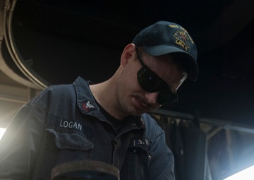 USS America Sailor brazes chlorinator pipe