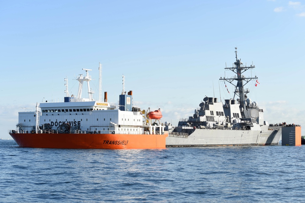 USS Fitzgerald is loaded onto heavy lift vessel Transshelf