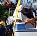 Maria ESF-10 PR Unified Command responders conduct salvage operations in Ponce, Puerto Rico