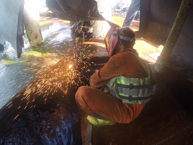 Welding, patchwork being done to refloat Pacific Paradise