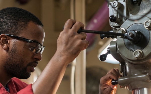 Sailor fabricates vent line fitting for fire pump