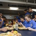 Nimitz Sailors Pray Before Meal