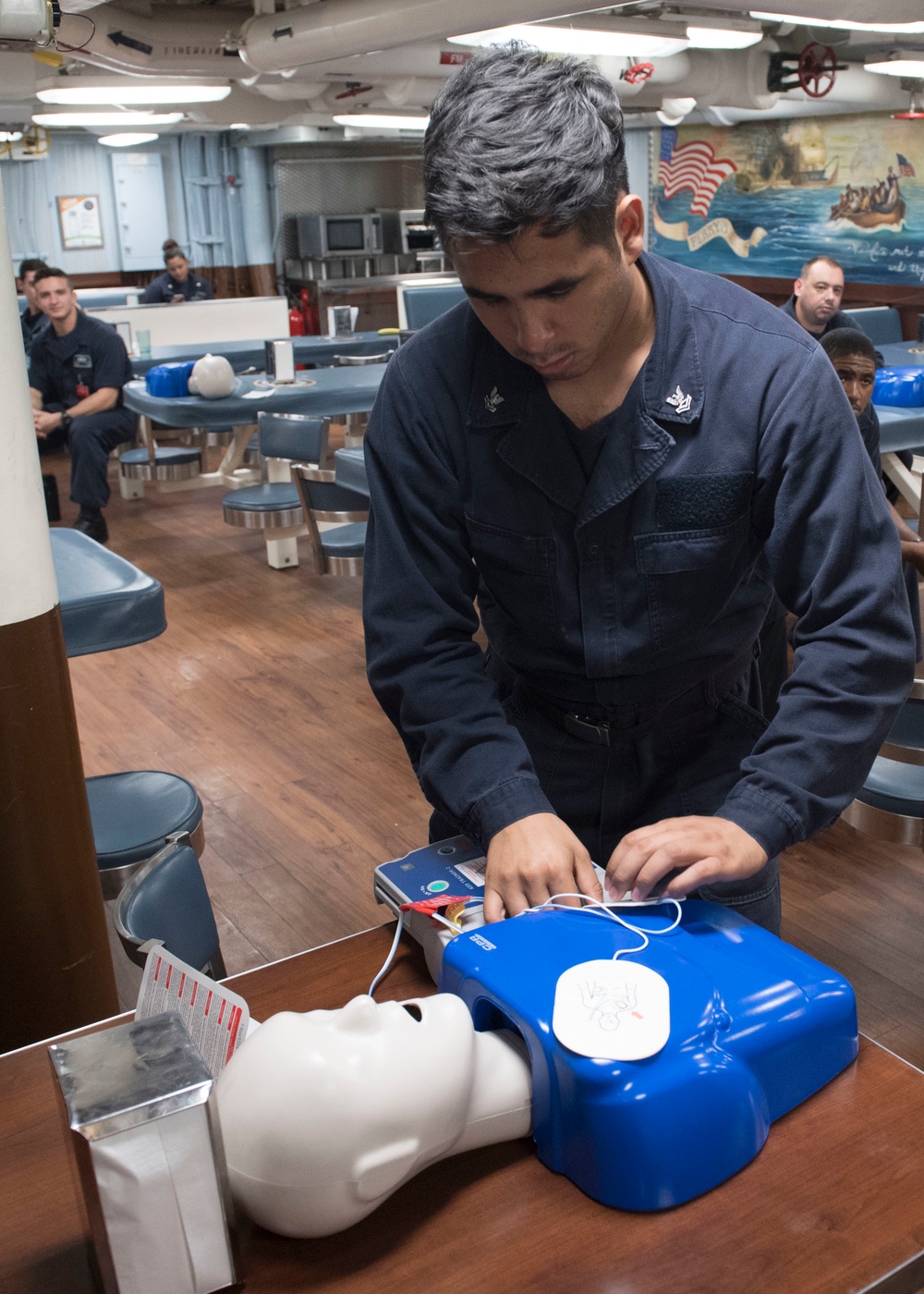 USS Lake Erie (CG 70) HT2 completes CPR training