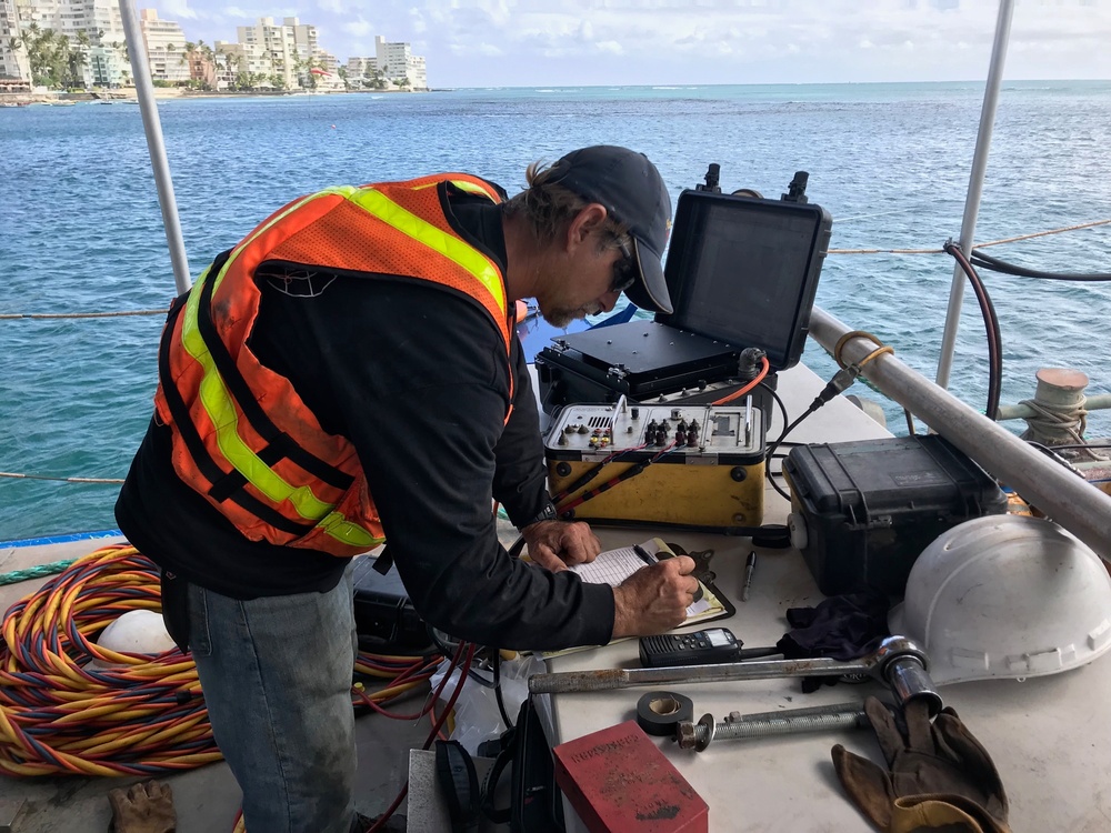 Dive supervisor manages dive operations on Pacific Paradise