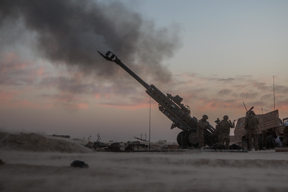 U.S. Army conduct field artillery strikes