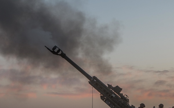 U.S. Army conduct field artillery strikes