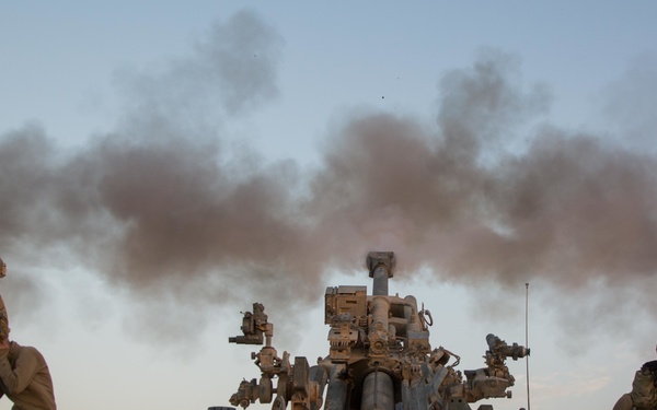 U.S. Army conduct field artillery strikes