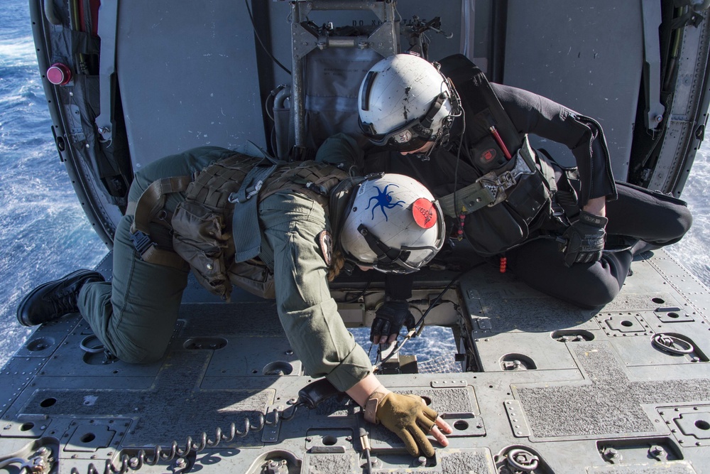 The amphibious transport dock ship USS New York (LPD 21), left, and the amphibious dock landing ship USS Oak Hill (LSD 51), right, receive fuel from the fleet replenishment oiler USNS Big Horn (T-AO 198) during a replenishment-at-sea