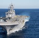 The amphibious transport dock ship USS New York (LPD 21), left, and the amphibious dock landing ship USS Oak Hill (LSD 51), right, receive fuel from the fleet replenishment oiler USNS Big Horn (T-AO 198) during a replenishment-at-sea