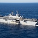 The amphibious transport dock ship USS New York (LPD 21), left, and the amphibious dock landing ship USS Oak Hill (LSD 51), right, receive fuel from the fleet replenishment oiler USNS Big Horn (T-AO 198) during a replenishment-at-sea