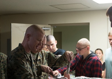 Headquarters and Support Battalion Leadership hosts Thanksgiving in the Barracks, MCIPAC-MCB Commanding General, Brig. Gen. Rock Jr. takes part