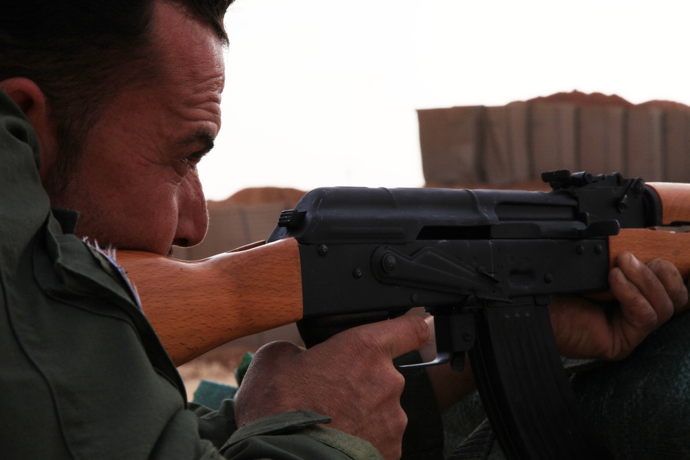 Members of the Raqqah Internal Security Force's Quick Reaction Force conduct marksmenship training