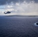 HSC-25 Helicopter Flies Over Tinian