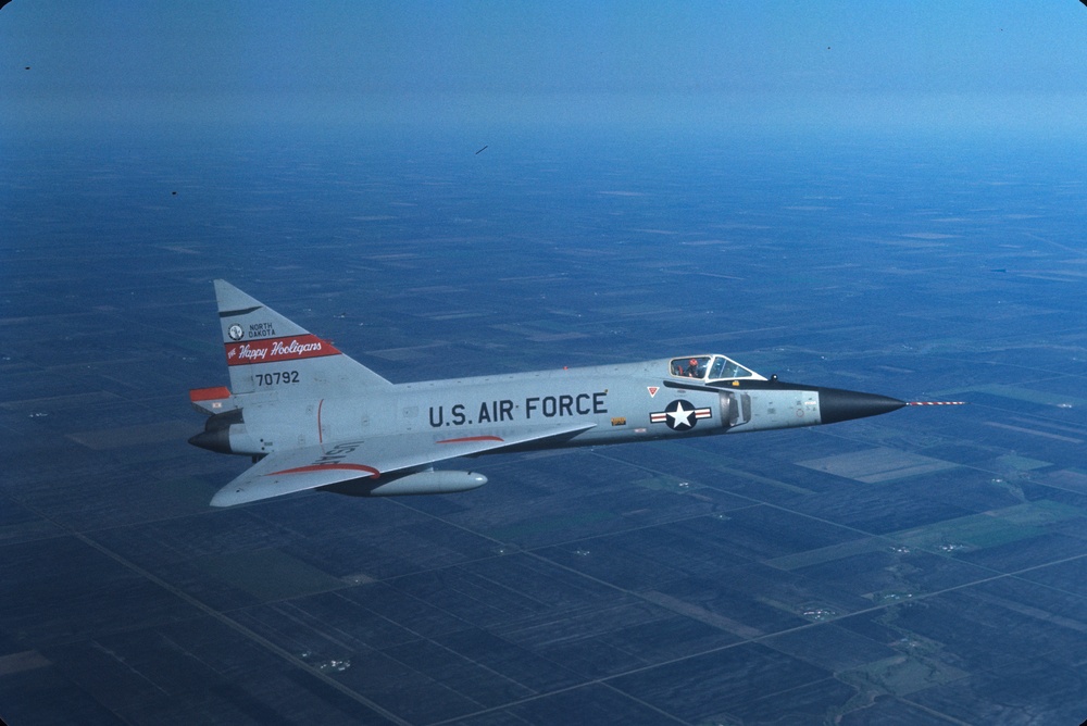 Historical F-102 Delta Dagger in flight over North Dakota
