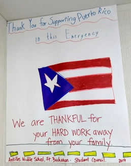 Students thank USACE Power Team with posters to brighten their office