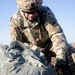 Paratrooper repacks his parachute