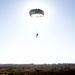 A descending paratrooper