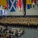 Sailors participate in a frocking ceremony.