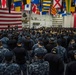 Sailors participate in a frocking ceremony.