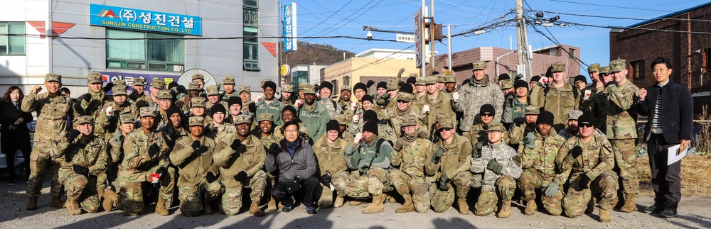 2ID Soldiers deliver charcoal briquettes families in Dongducheon, South Korea