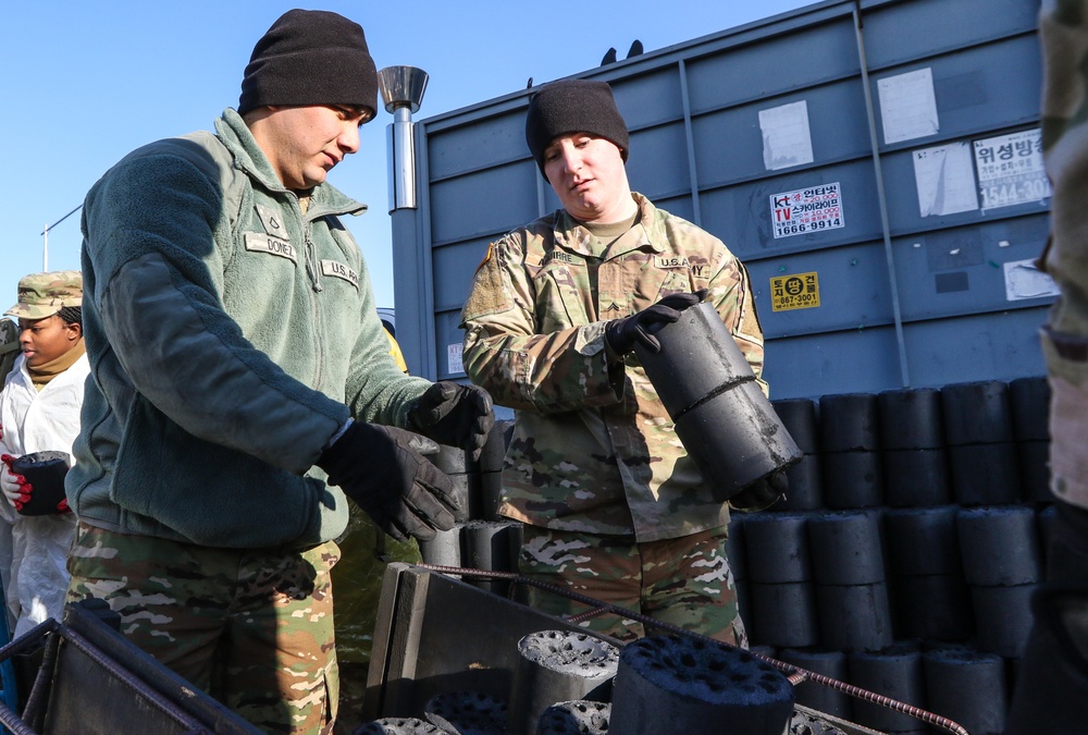 2ID Soldiers deliver charcoal briquettes families in Dongducheon, South Korea