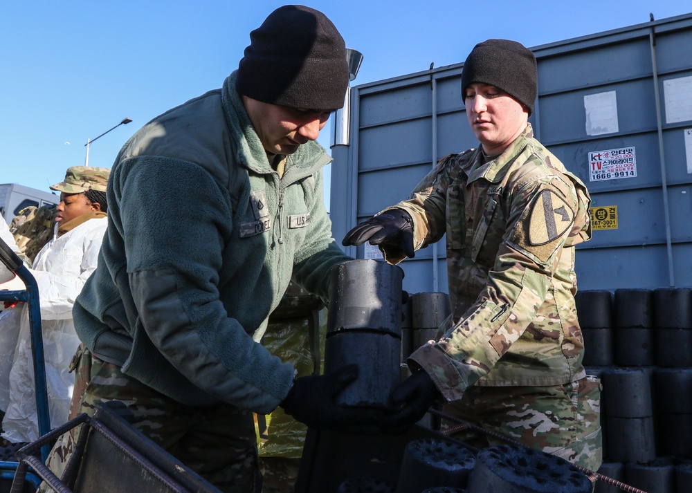 DVIDS - Images - 2ID Soldiers deliver charcoal briquettes families in ...