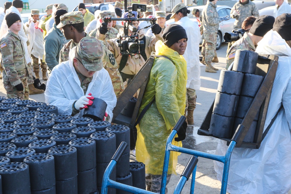 2ID Soldiers deliver charcoal briquettes families in Dongducheon, South Korea