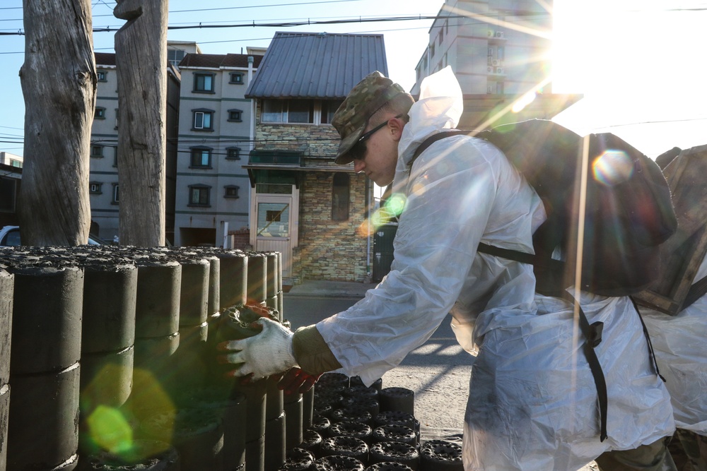 2ID Soldiers deliver charcoal briquettes families in Dongducheon, South Korea