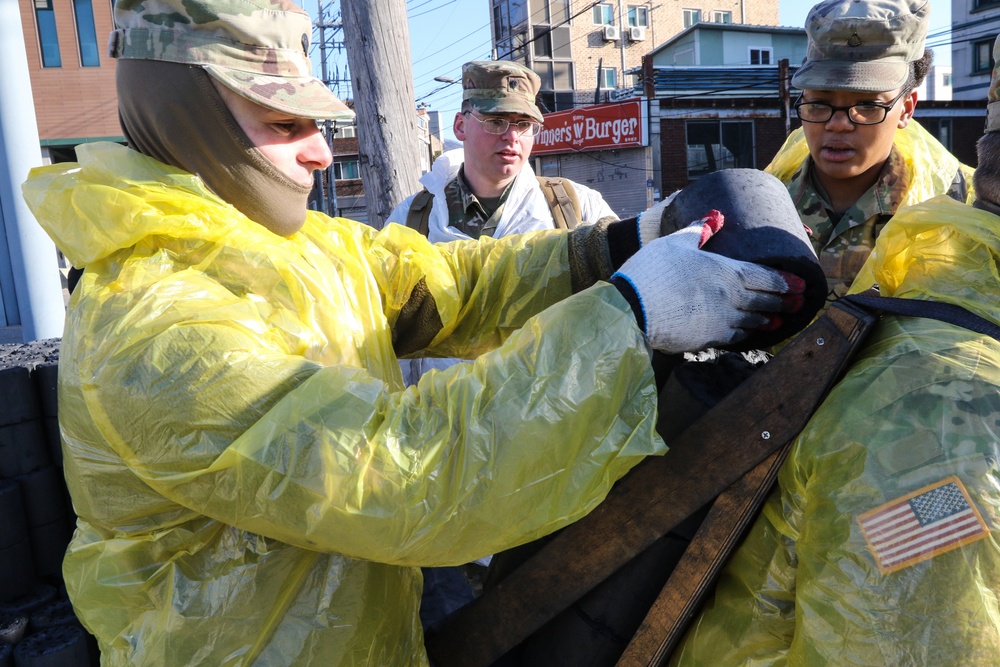 2ID Soldiers deliver charcoal briquettes families in Dongducheon, South Korea