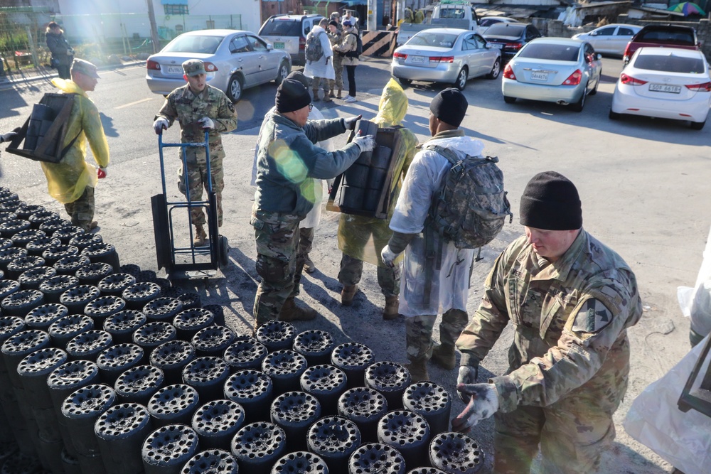 2ID Soldiers deliver charcoal briquettes families in Dongducheon, South Korea