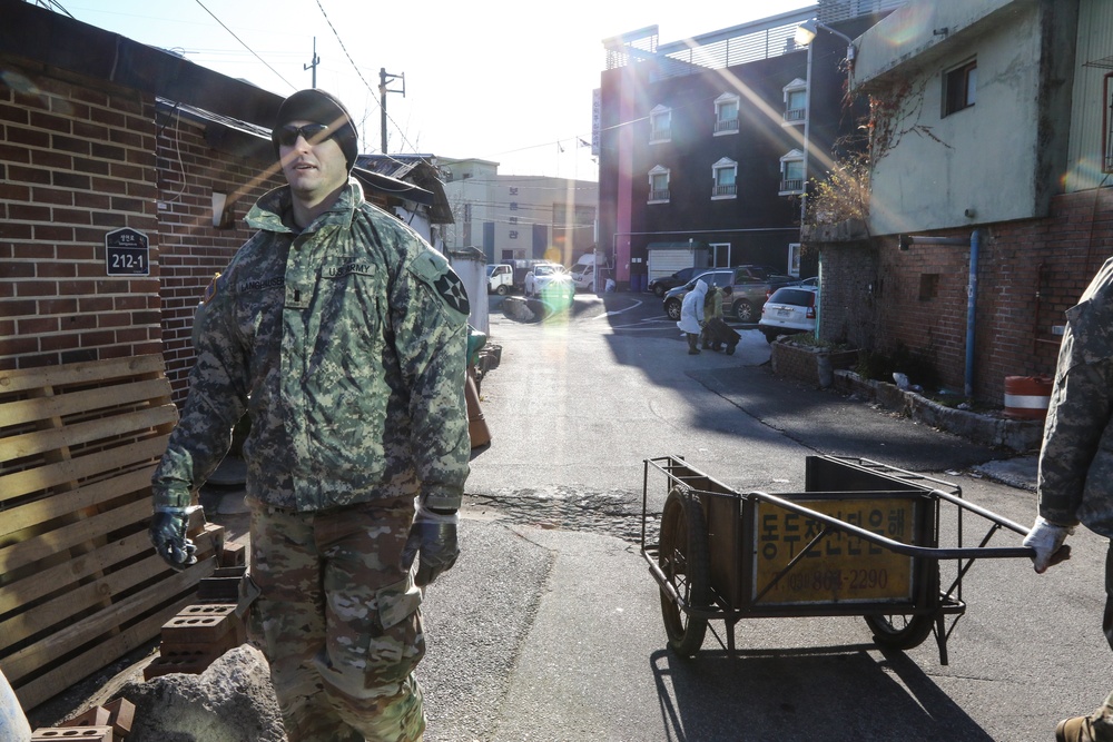 2ID Soldiers deliver charcoal briquettes families in Dongducheon, South Korea