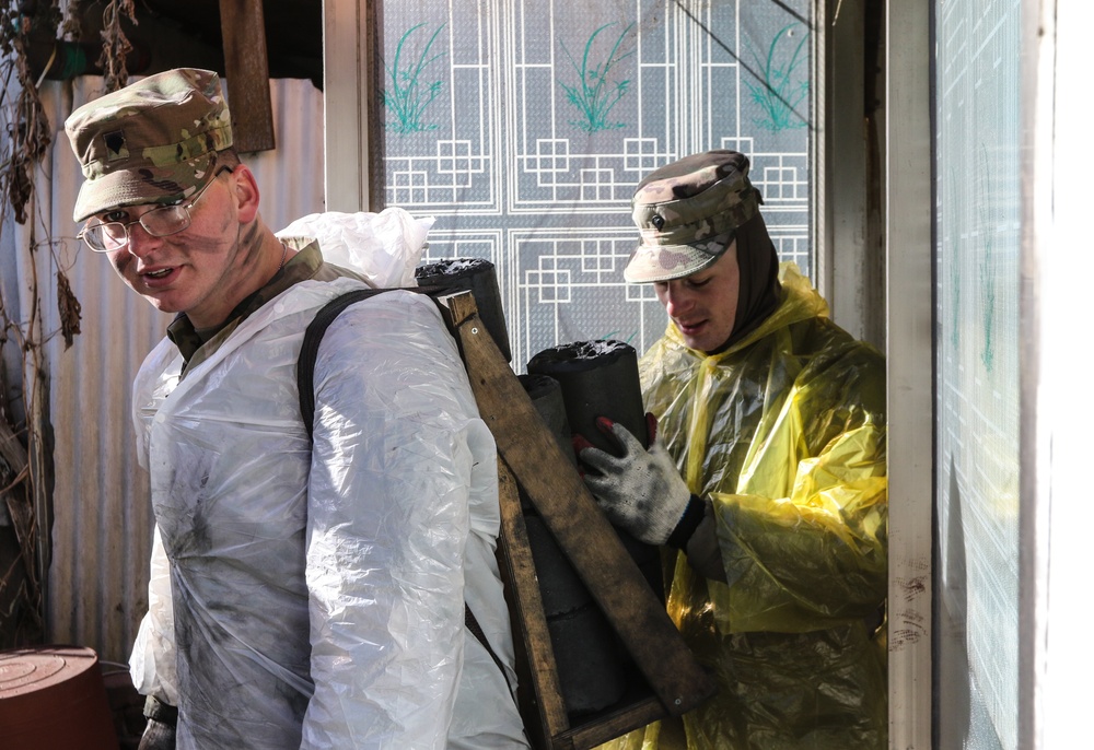 2ID Soldiers deliver charcoal briquettes families in Dongducheon, South Korea