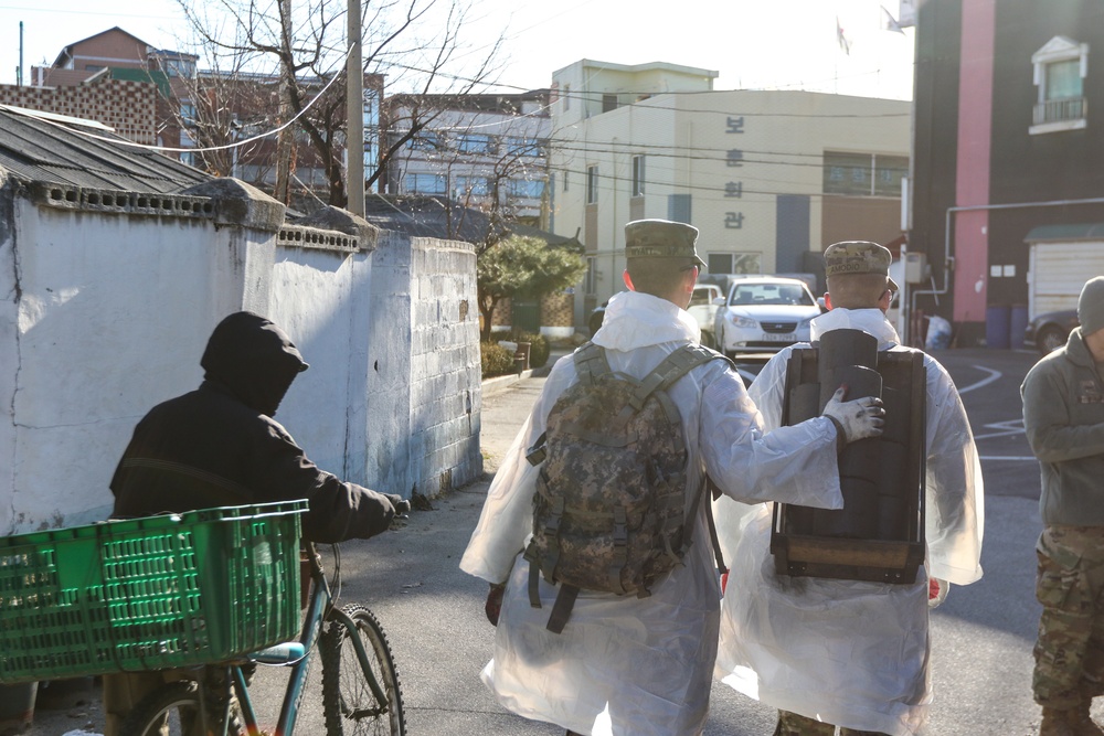 2ID Soldiers deliver charcoal briquettes families in Dongducheon, South Korea