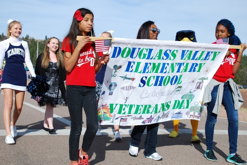 Students march in Veterans Parade