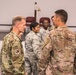 Maj. Gen. Costin speaks with deployed service members at Al Udeid Air Base