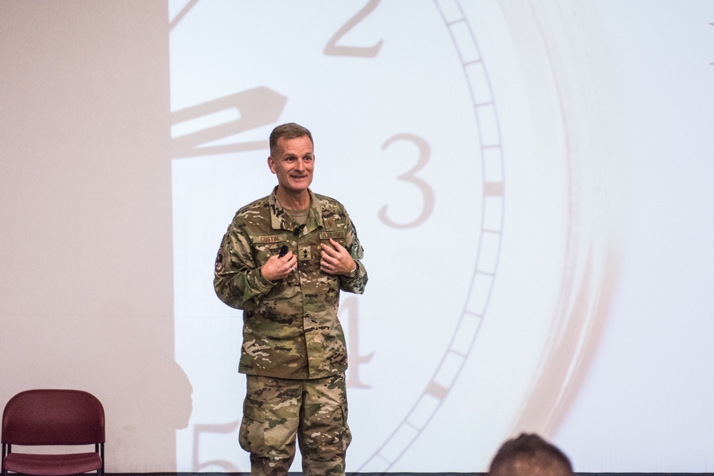 Maj. Gen. Costin speaks with deployed service members at Al Udeid Air Base
