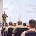 Maj. Gen. Costin speaks with deployed service members at Al Udeid Air Base