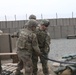 CSM Jeffrey Dillingham gets assistance loading the M777