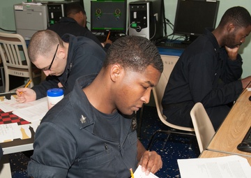 USS America Sailors participate in a command climate survey
