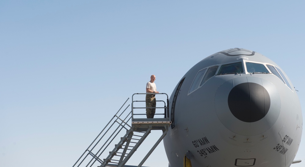 908th Expeditionary Air Refueling Squadron supports F-22 Raptors conducting airstrikes in Iraq and Syria