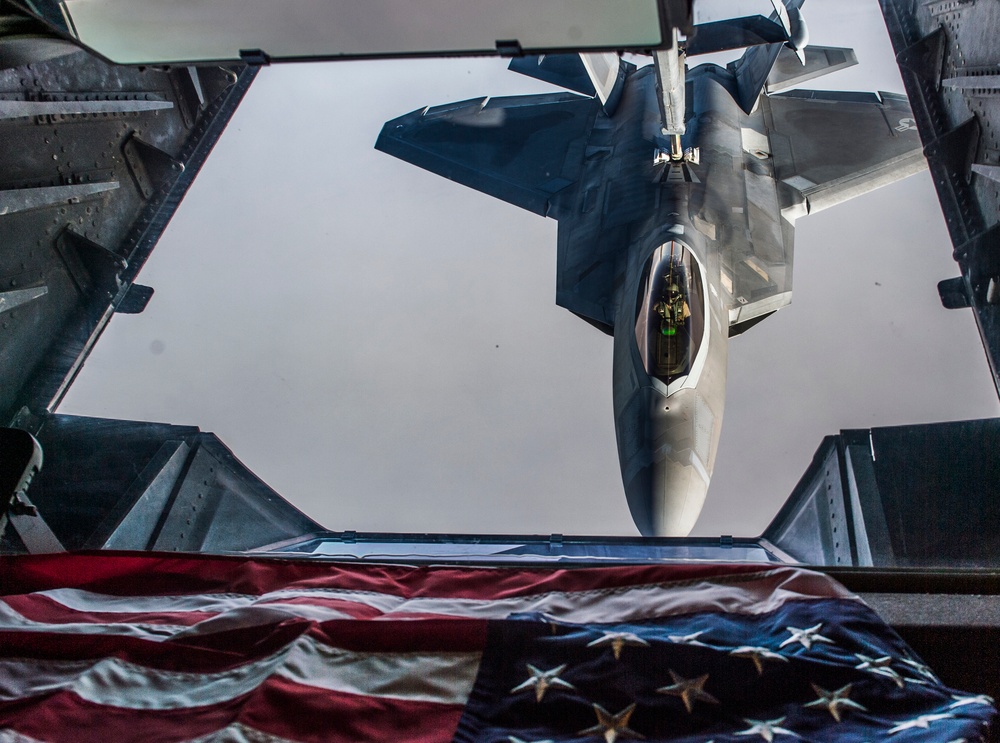 908th Expeditionary Air Refueling Squadron supports F-22 Raptors conducting airstrikes in Iraq and Syria