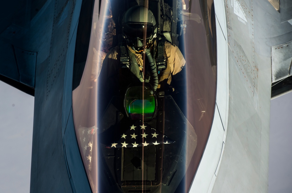 908th Expeditionary Air Refueling Squadron supports F-22 Raptors conducting airstrikes in Iraq and Syria