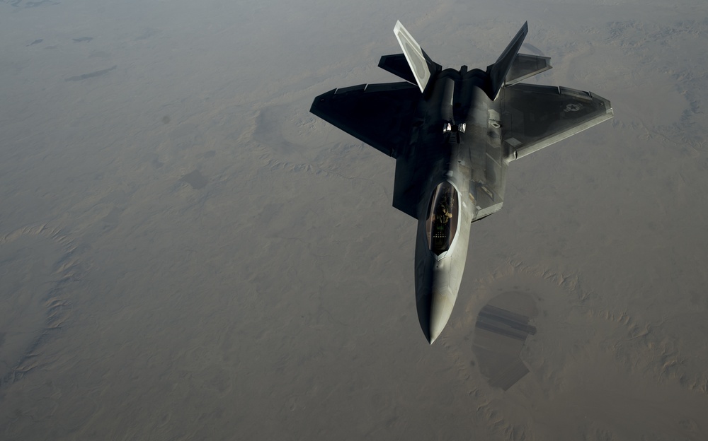 908th Expeditionary Air Refueling Squadron supports F-22 Raptors  conducting airstrikes in Iraq and Syria