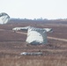 U.S Army Paratroppers landing after completing their jump in participation for the 20th Annual Randy Oler Memorial Operation Toy Drop, hosted by U. S. Army Civil Affairs &amp; Psychological Operations Command (Airborne), Dec. 01, 2017 on Sicily Drop Zone at F