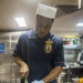 USS America Sailor prepares food in flag mess