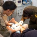 Iraqi medical staff member with Coalition support provide medical care at Taji