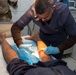 Iraqi medical staff member with Coalition support provide medical care at Taji