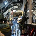 Army paratroopers stationed at Ft. Bragg get ready to exit a U.S. Air Force C-130 Hercules as part of Operation Toy Drop