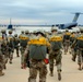 Paratroopers move across Pope Airfield